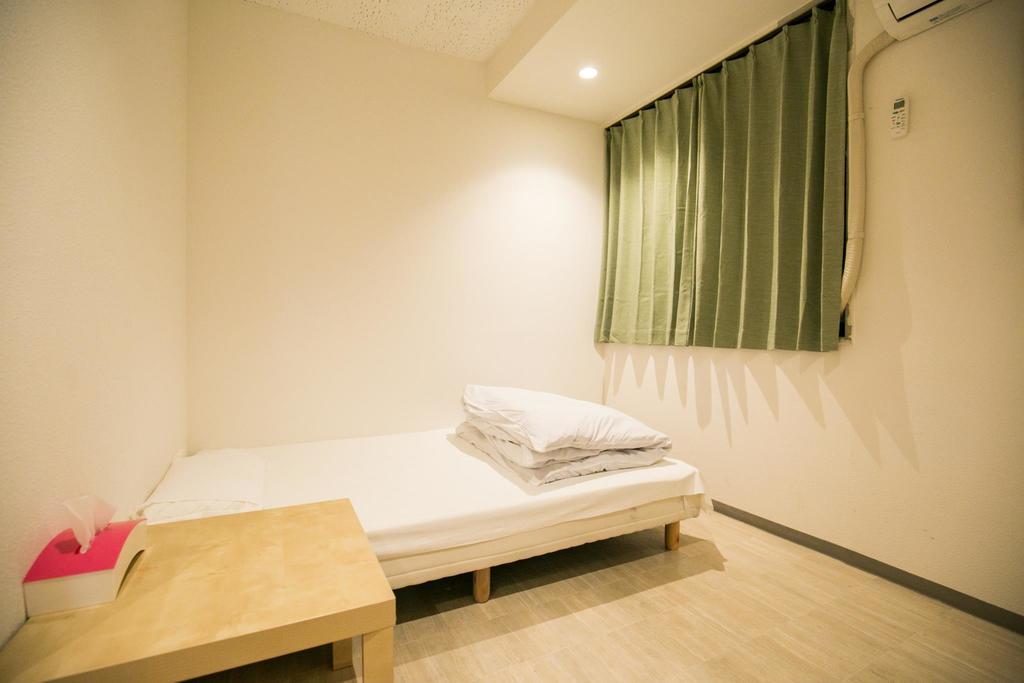 123 Guesthouse Осака Номер фото