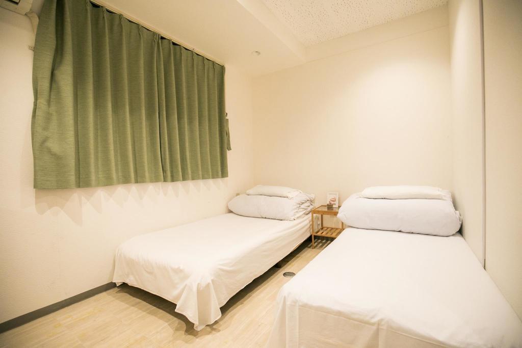 123 Guesthouse Осака Номер фото